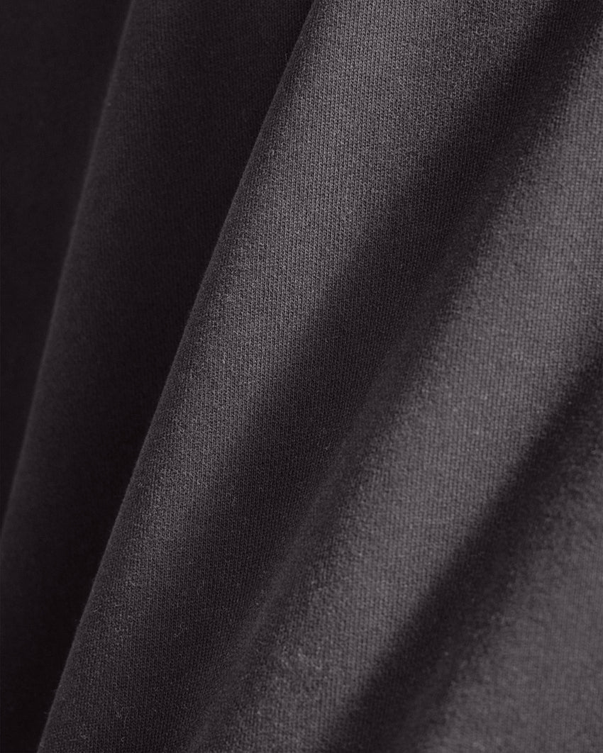 Dark-Charcoal | Close-up of the Heavyweight Fleece Hoodie fleece fabric texture